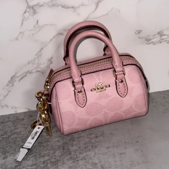 Coach Mini Rowan Bag Charm In Signature Canvas Powder Pink - Picture 1 of 3